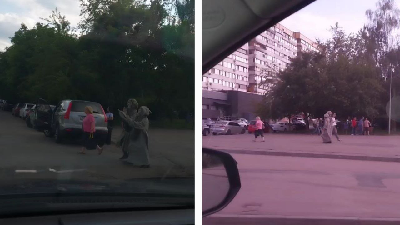 Юнаки ходили по вулиці у Дніпрі в захисних костюмах 
