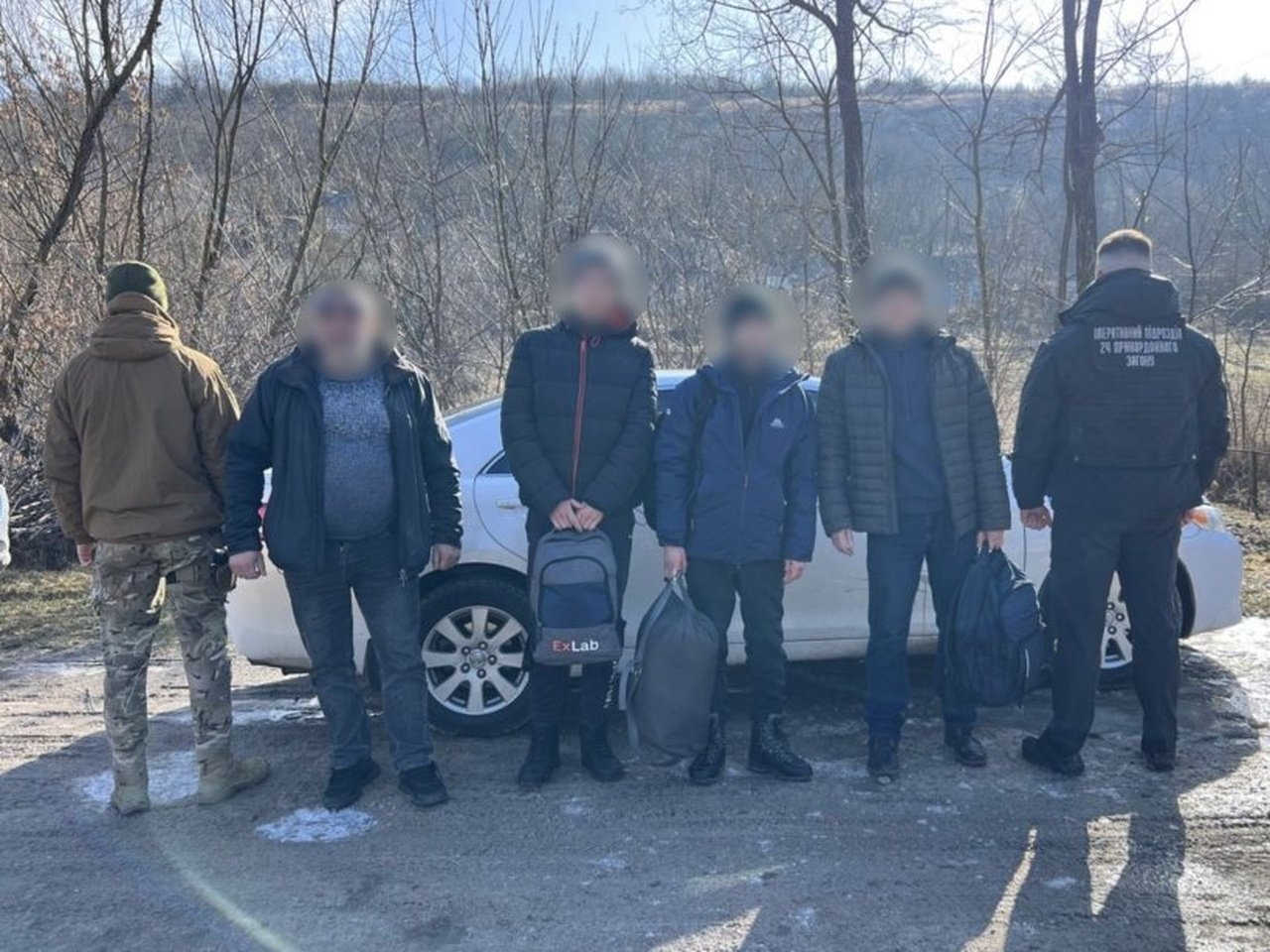 Затримані чоловіки